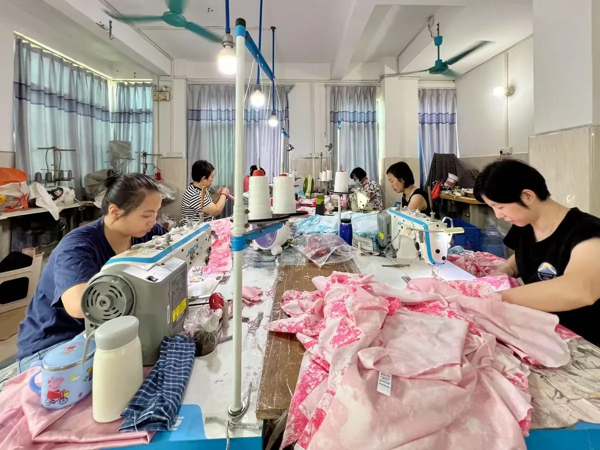 Wide view of Zhixiang apparel production workshop